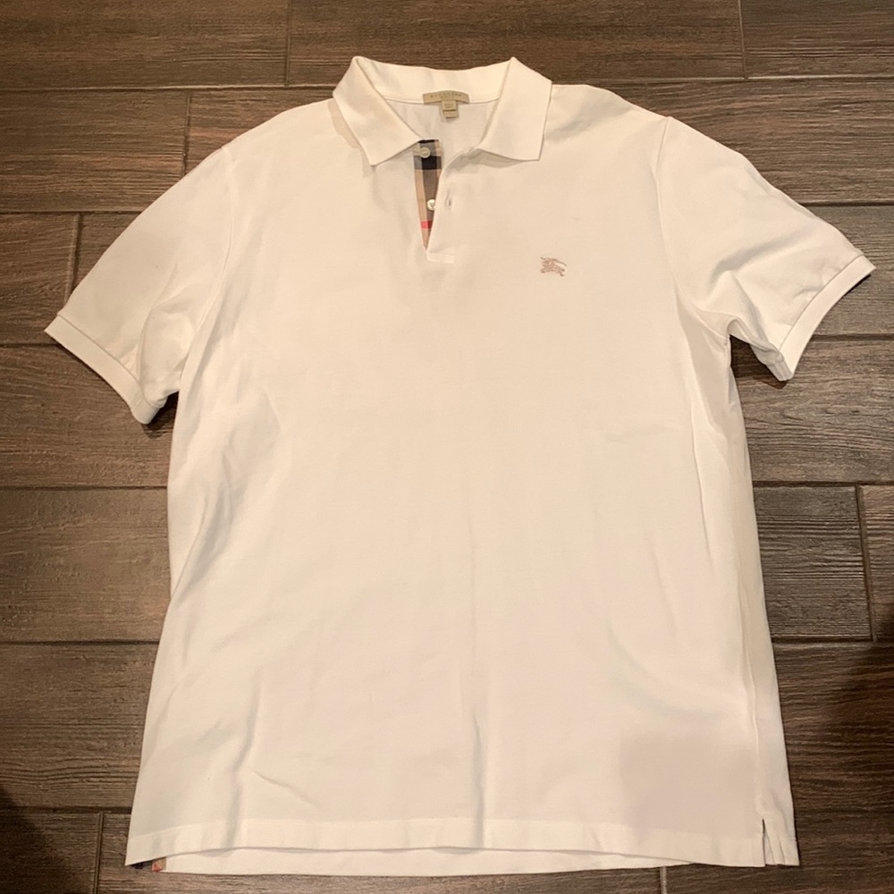 Men’s Burberry polo, size XL, used but in good condition.